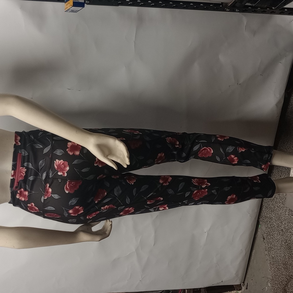 Black stretch pants with red flowers